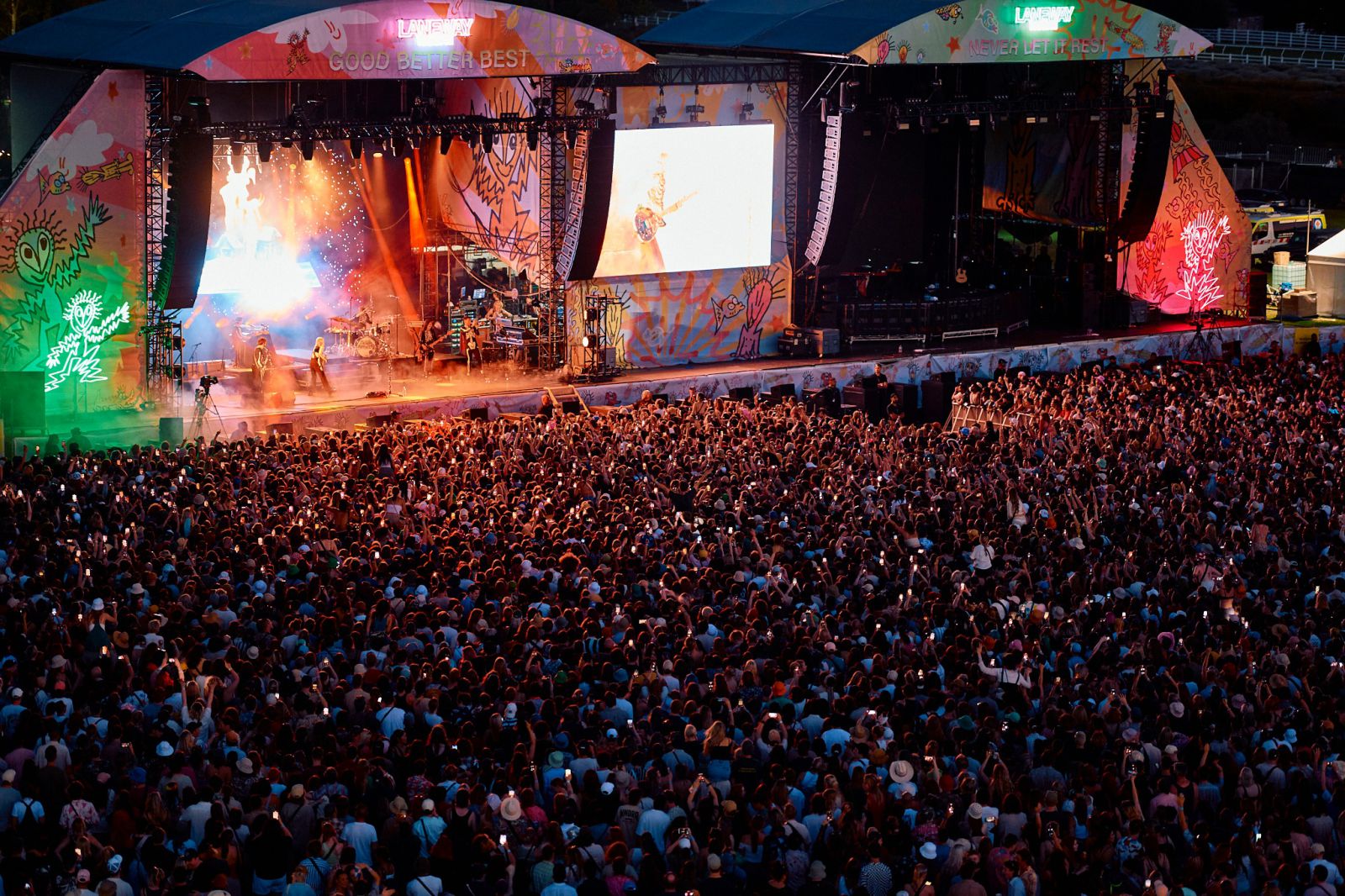 A massice crowd sances in fron of a performing band at the St Jeromes Music Festival in Australia